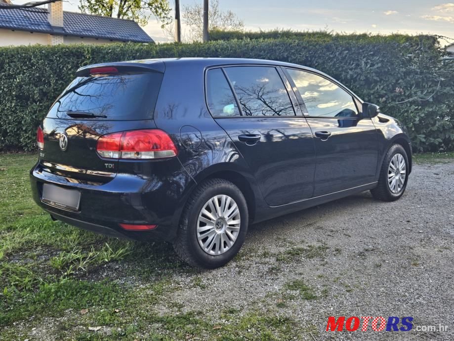 2012' Volkswagen Golf VI 1,6 Tdi photo #4
