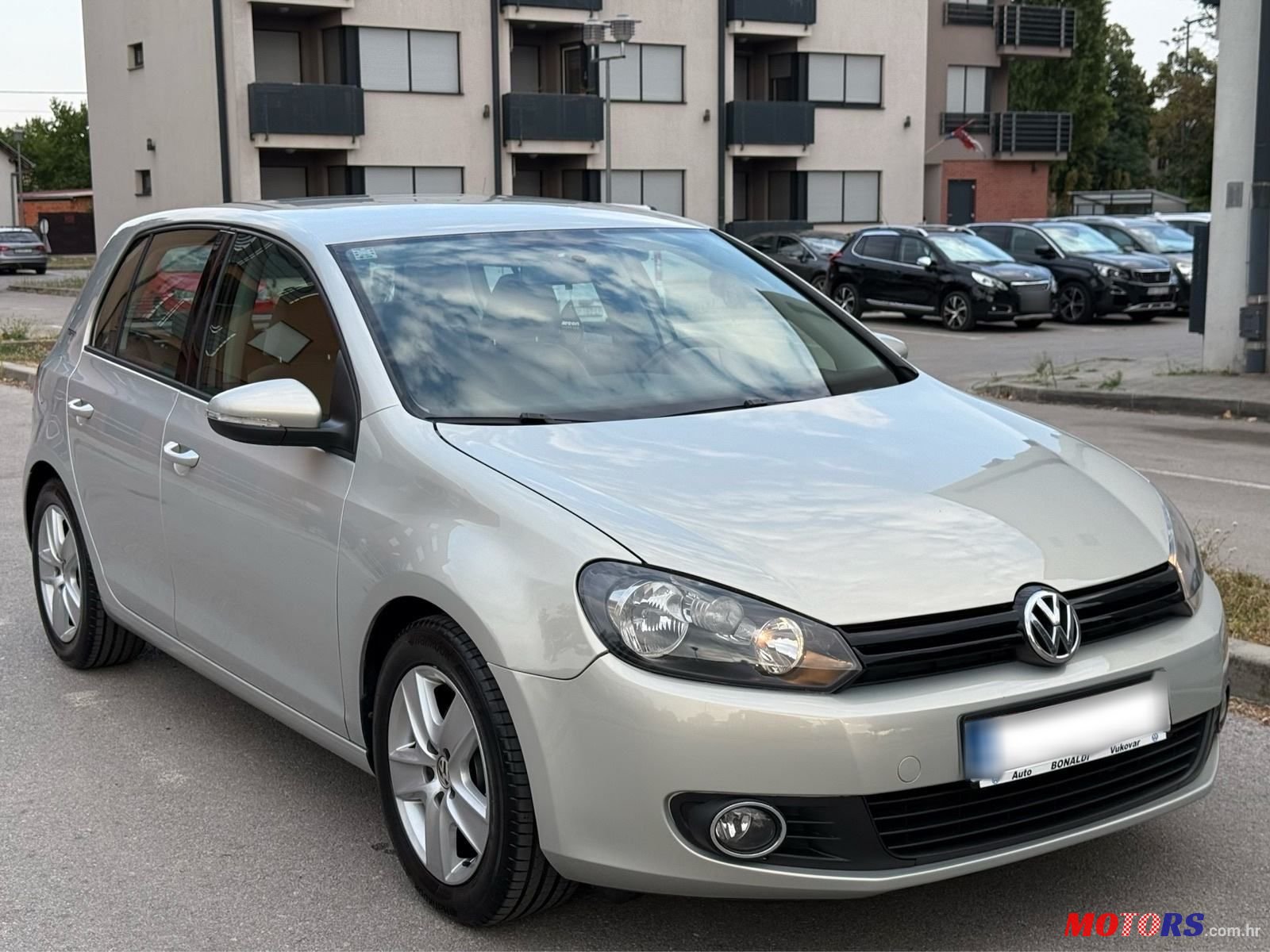 2011' Volkswagen Golf VI 1,6 Tdi photo #2