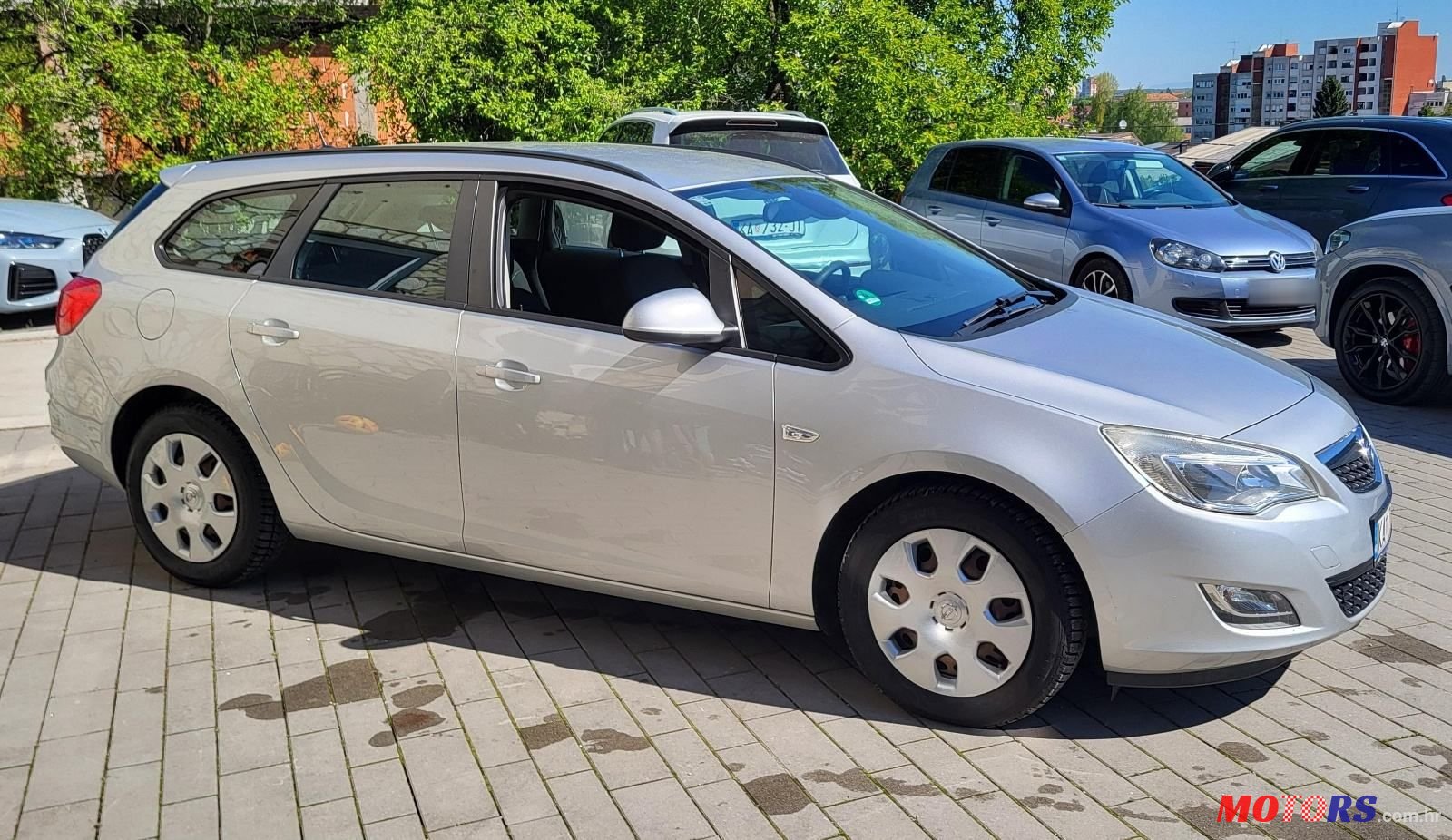2011' Opel Astra Karavan photo #2