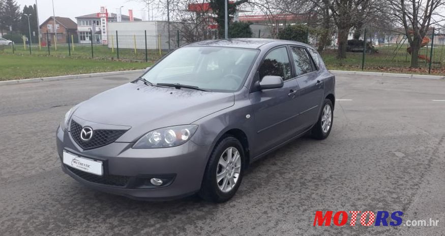 2006' Mazda 3 1,6 D photo #1