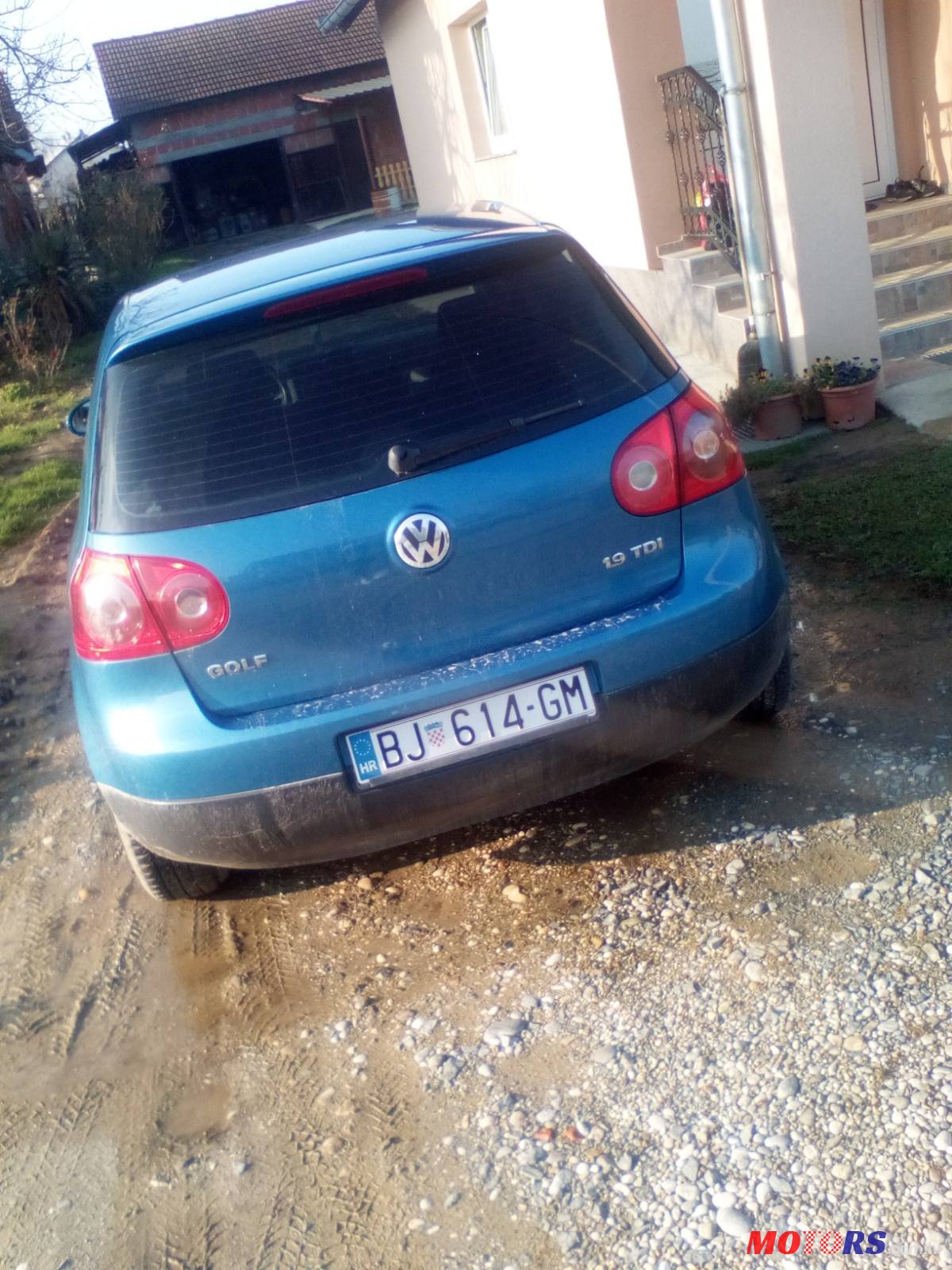 2004' Volkswagen Golf V photo #2