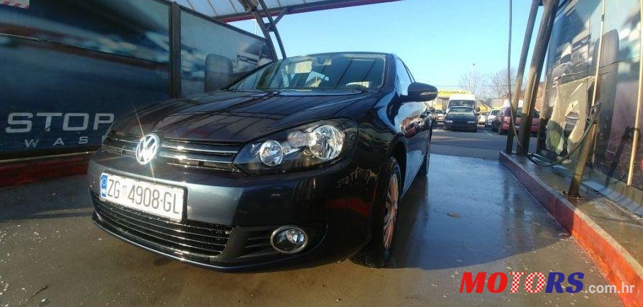 2009' Volkswagen Golf VI 1,6 photo #1
