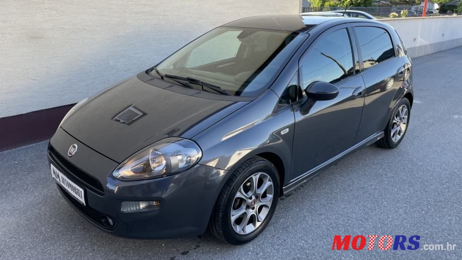 2013' Fiat Punto Evo photo #1