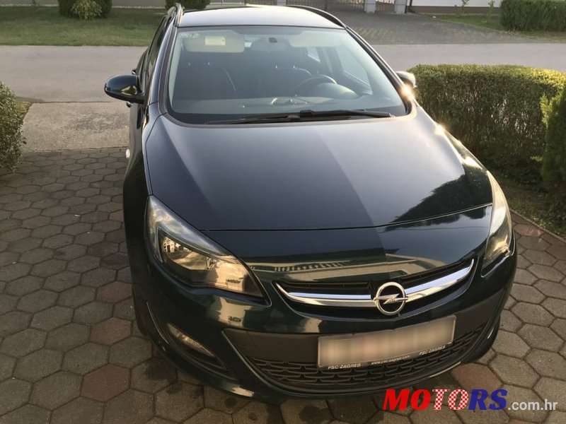 2015' Opel Astra Karavan photo #1