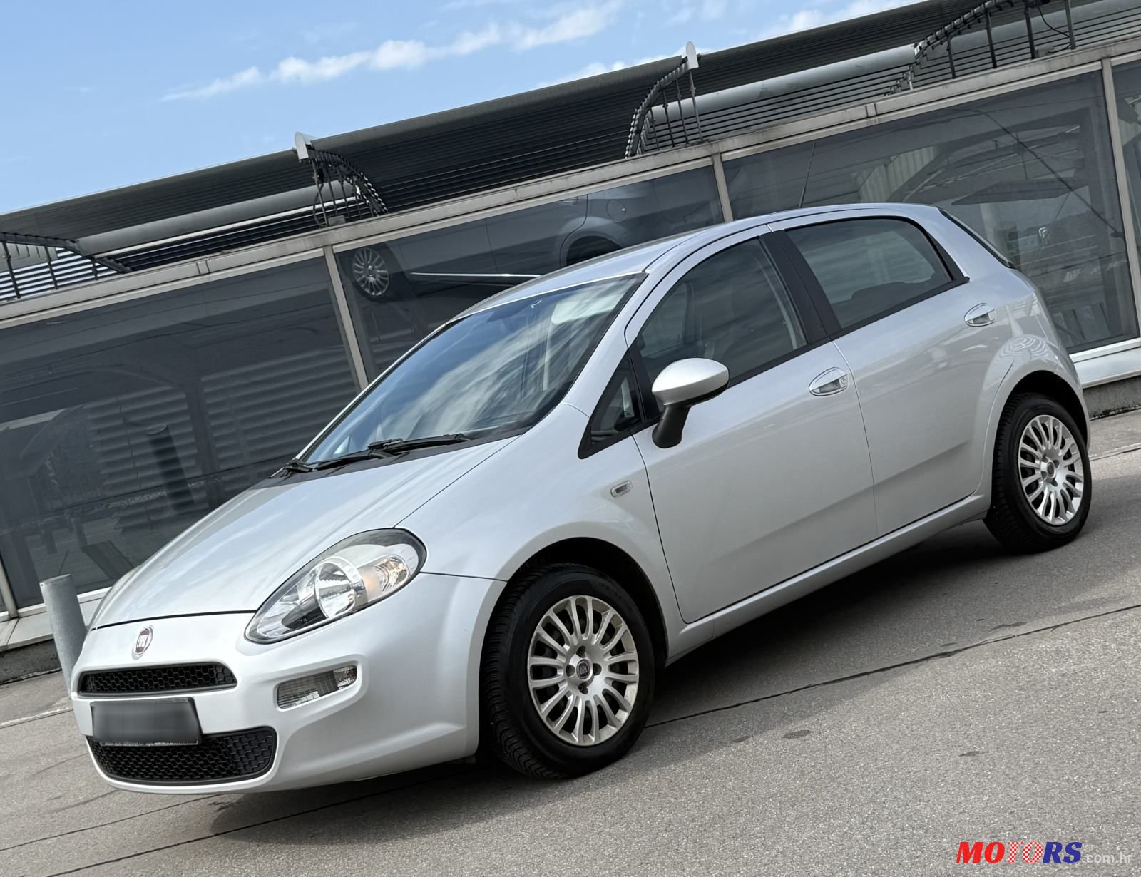 2013' Fiat Grande Punto 1.3Jtd photo #1