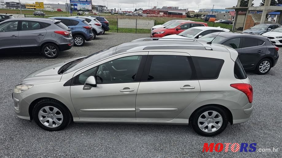 2008' Peugeot 308 Sw photo #2