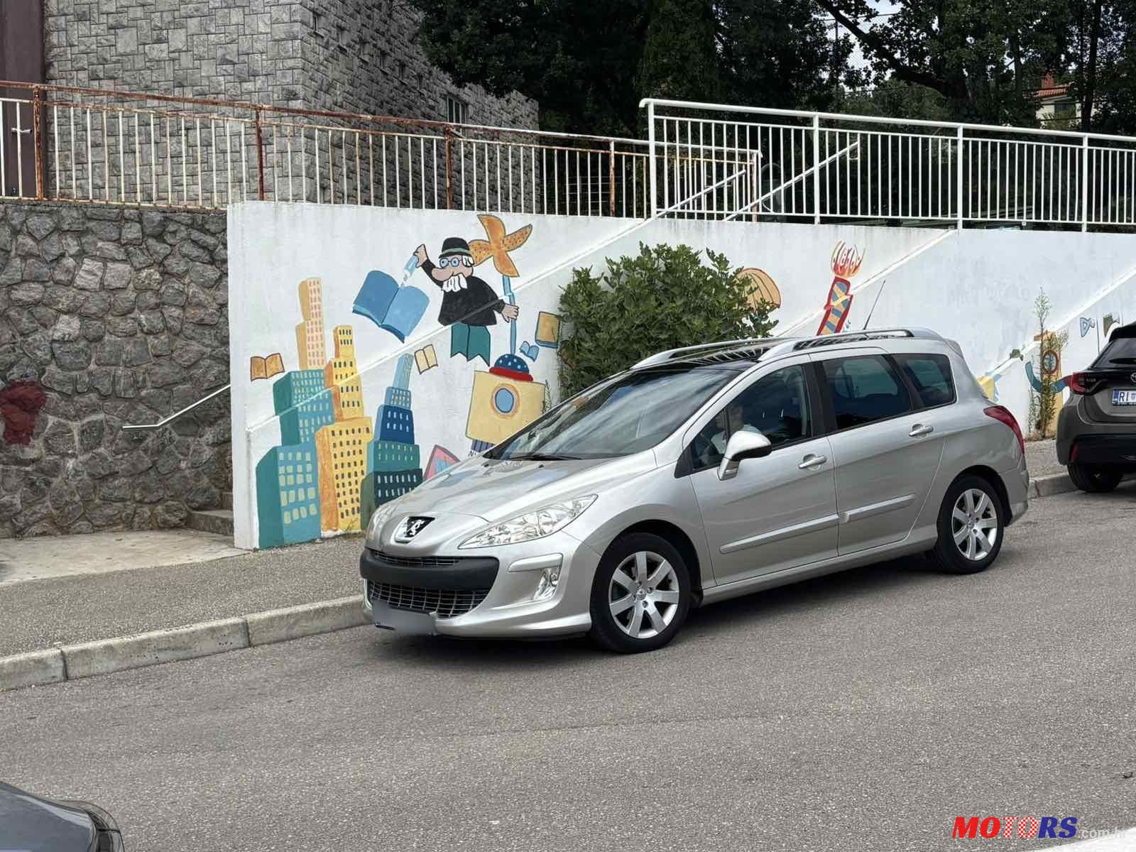 2008' Peugeot 308 Sw photo #1
