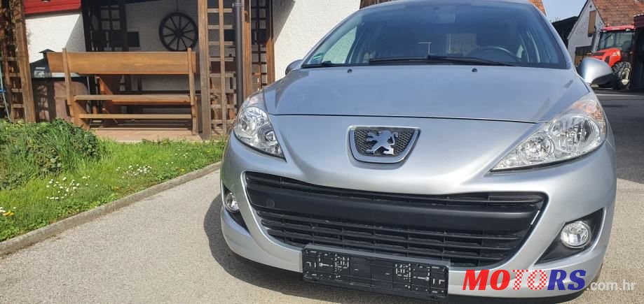 2012' Peugeot 207 Sw photo #1