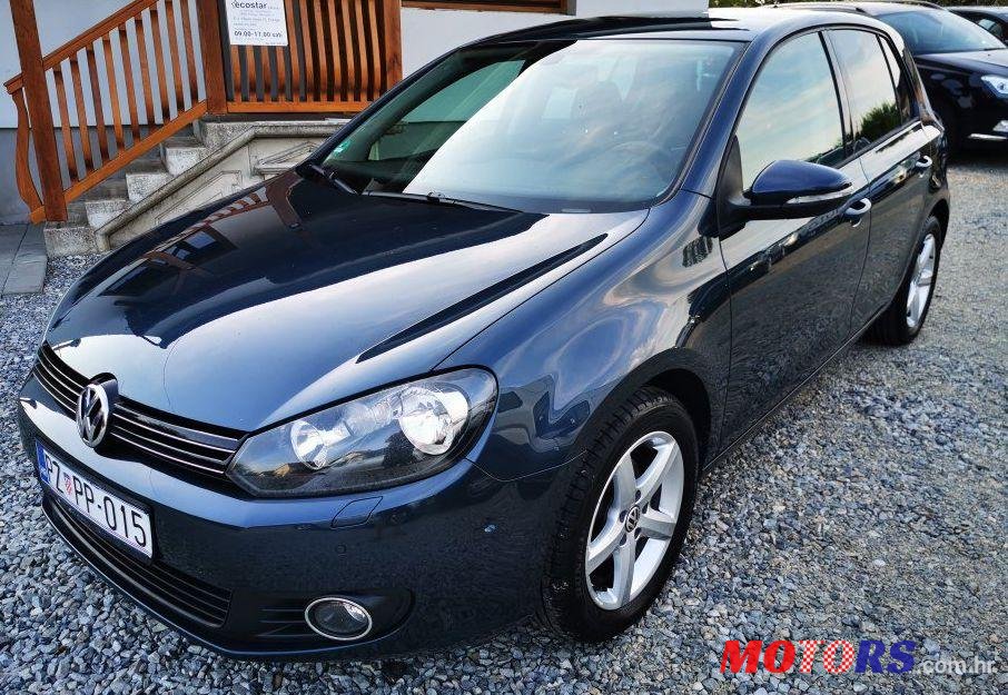 2011' Volkswagen Golf VI 1,6 Tdi photo #1