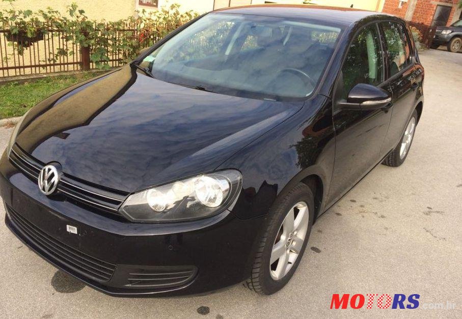 2010' Volkswagen Golf VI 1,6 Tdi photo #1