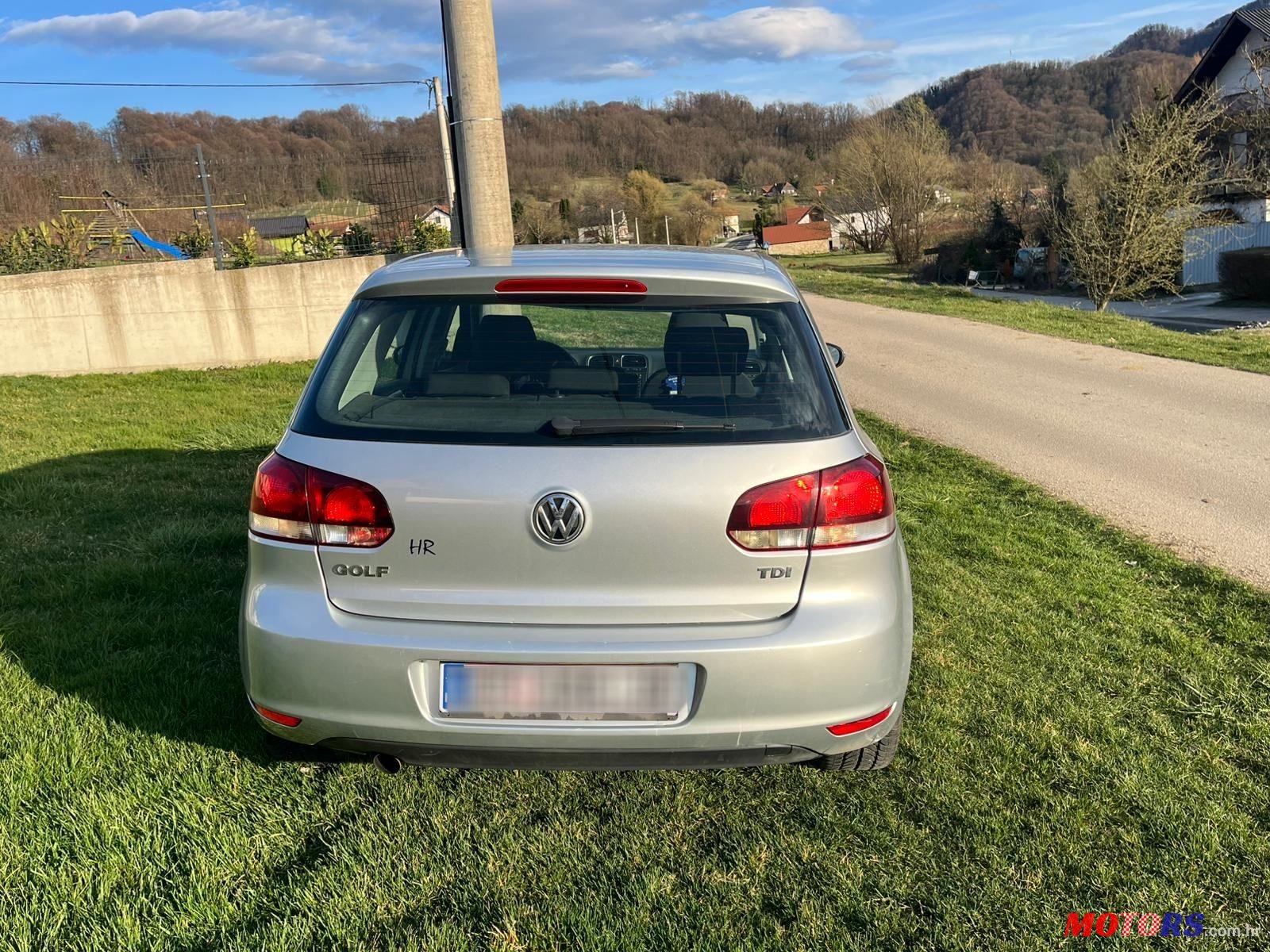 2010' Volkswagen Golf VI 1,6 Tdi photo #1