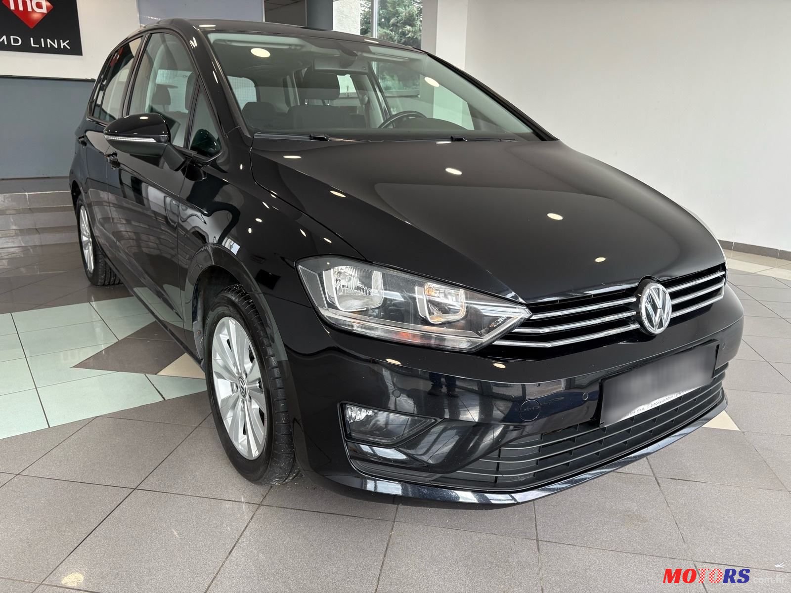 2015' Volkswagen Golf Sportsvan photo #3