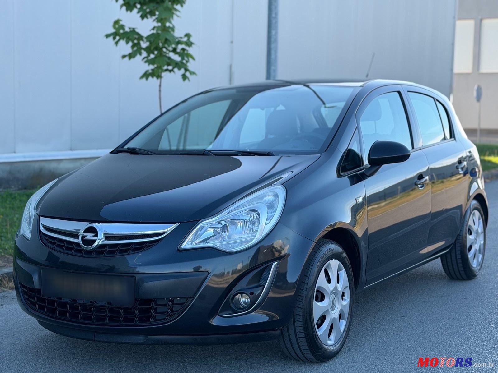 2012' Opel Corsa 1,3 Cdti photo #1
