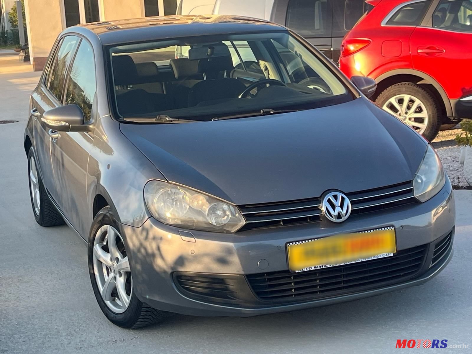 2009' Volkswagen Golf VI 1,6 Tdi photo #2