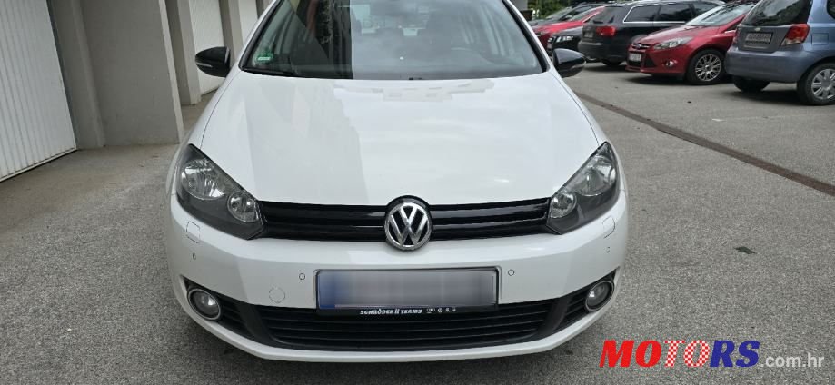 2012' Volkswagen Golf VI 1,6 Tdi photo #3