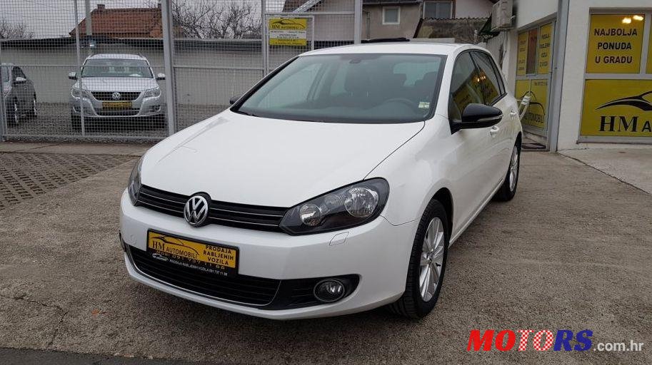 2011' Volkswagen Golf VI 1,6 Tdi photo #1