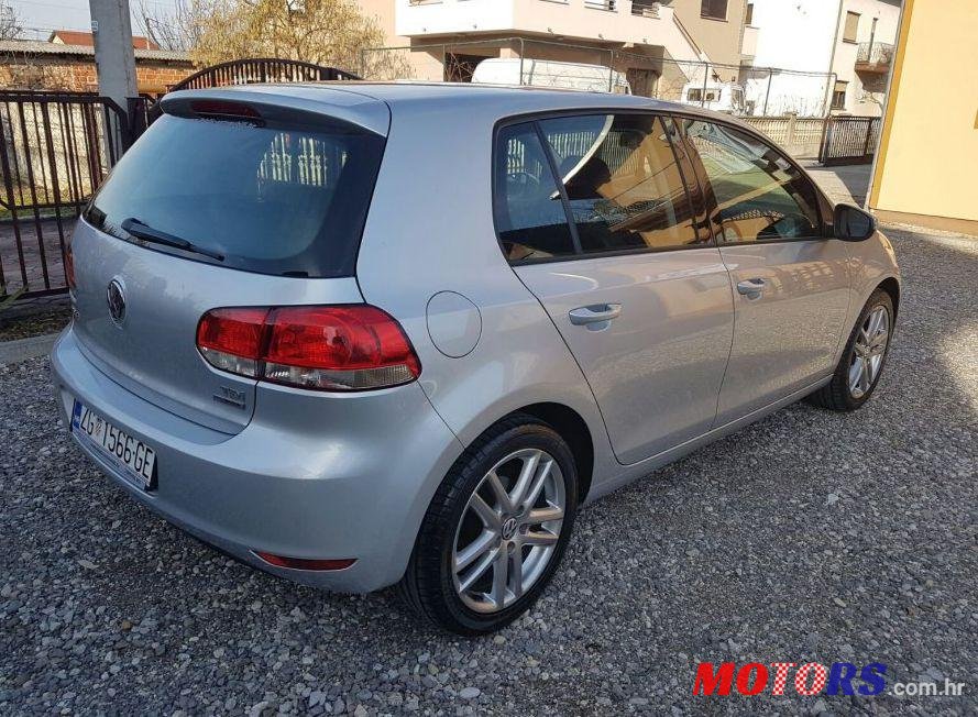 2012' Volkswagen Golf VI 1,6 Tdi photo #1