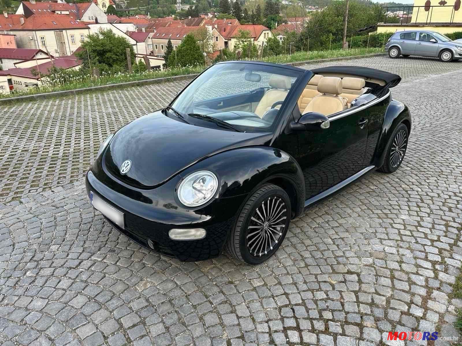 2004' Volkswagen Beetle 1,6 photo #5
