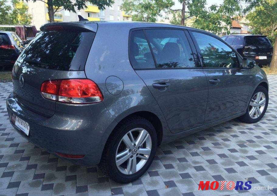 2012' Volkswagen Golf VI 1,6 Tdi photo #2