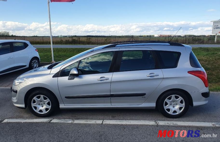 2009' Peugeot 308 Sw 1,6 Hdi photo #1