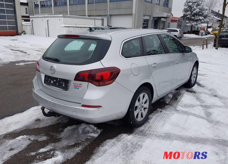 2014' Opel Astra Karavan photo #1