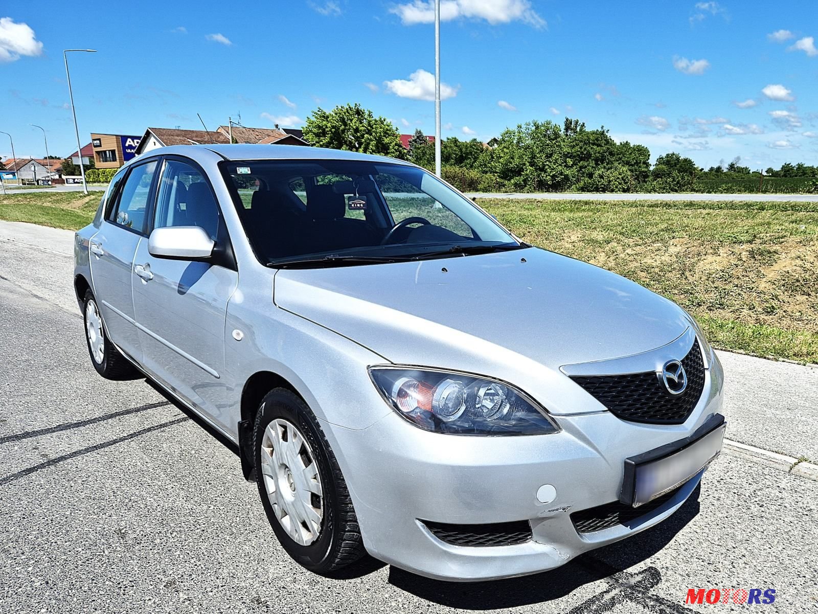 2005' Mazda 3 Sport 1,4 I Ce photo #3