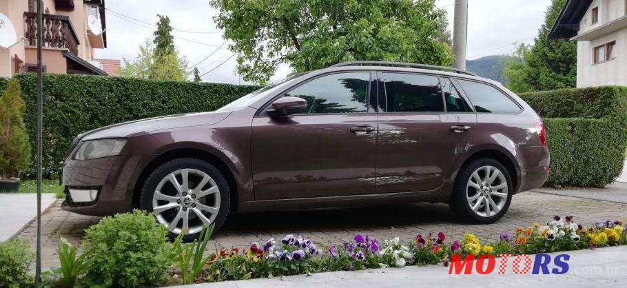 2013' Skoda Octavia Combi 1,6 Tdi photo #1