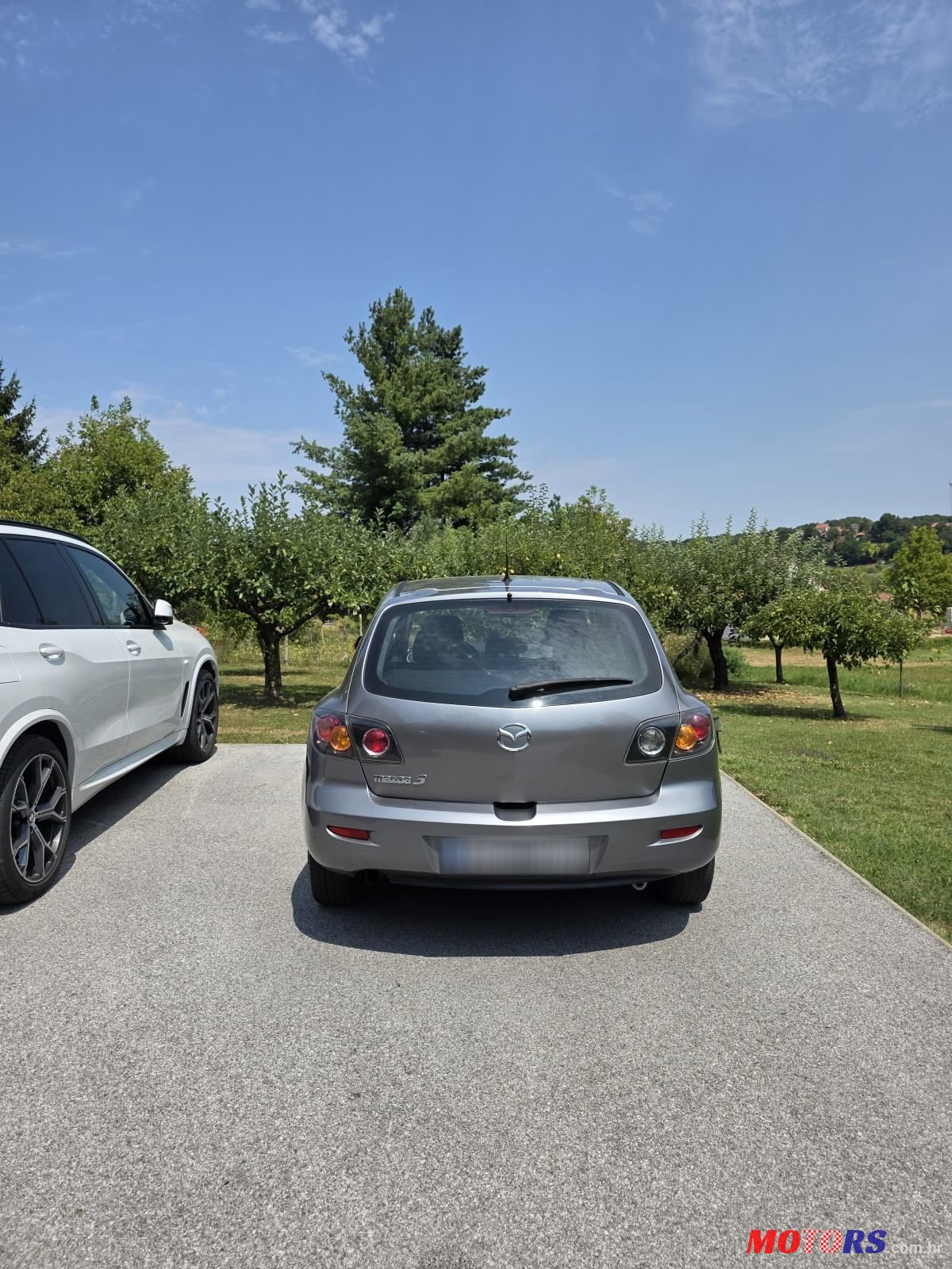 2006' Mazda 3 Sport 1,4 I Ce photo #3