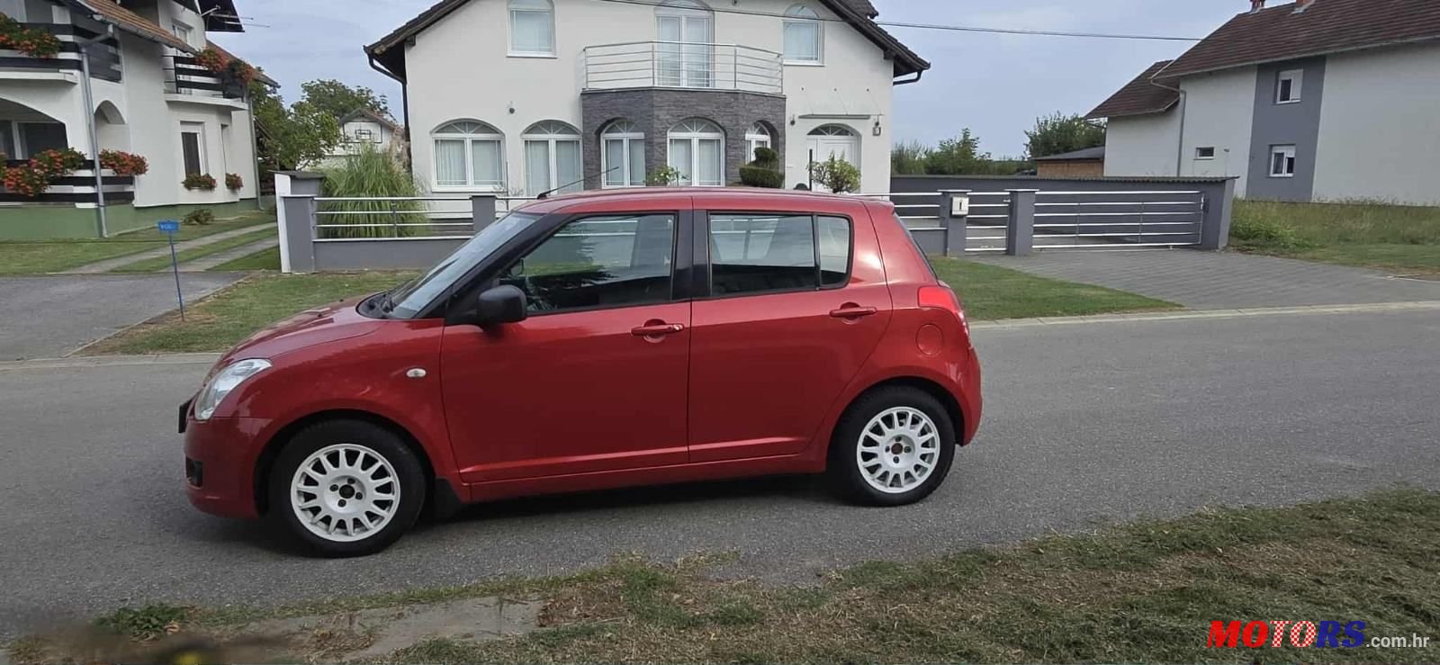 2008' Suzuki Swift 1,3 photo #1