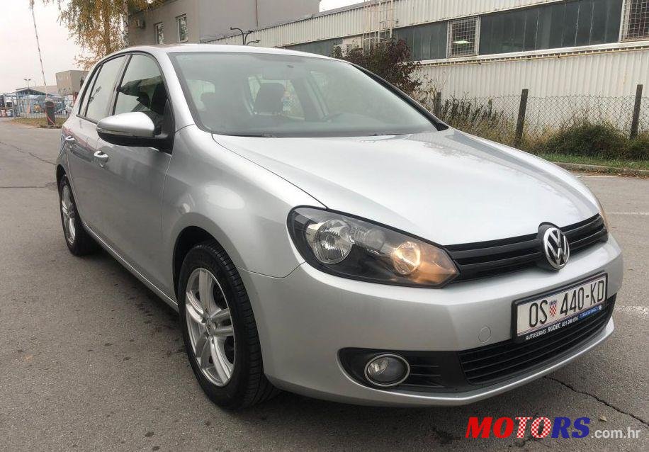 2012' Volkswagen Golf VI 1,6 Tdi photo #1