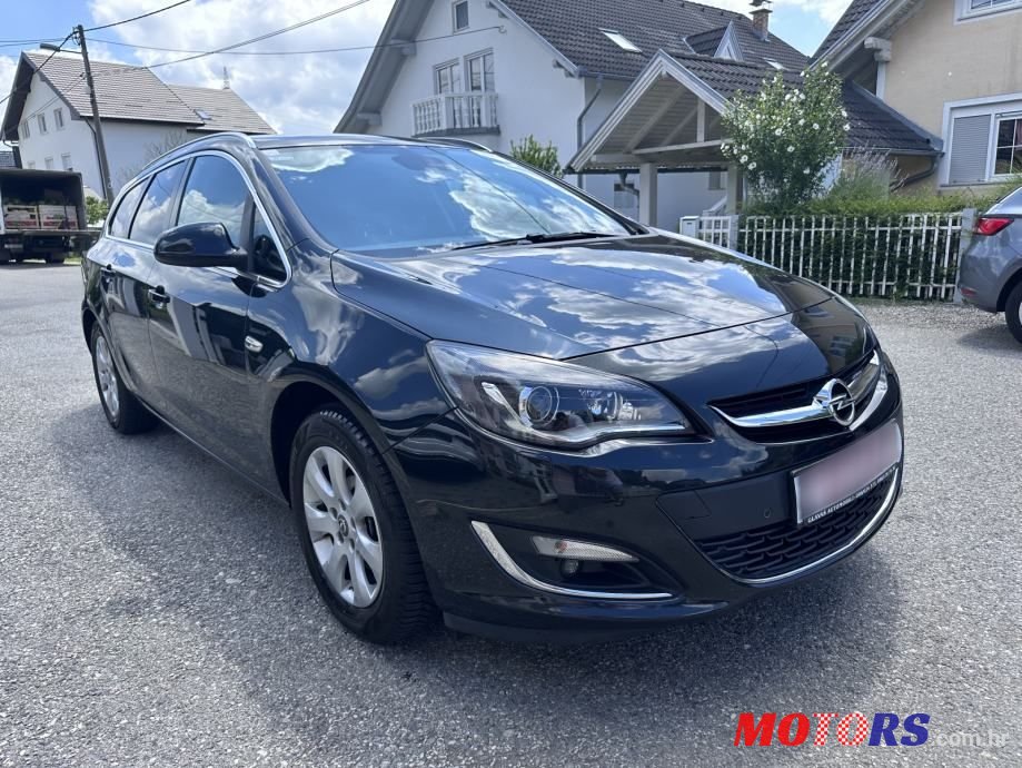 2015' Opel Astra Karavan photo #1