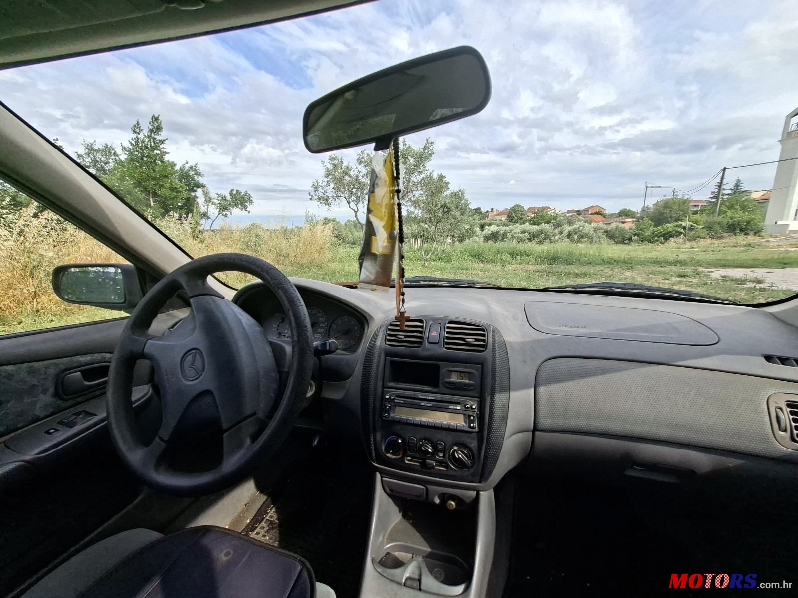 1999' Mazda 323 1.3 Ce 4T photo #5