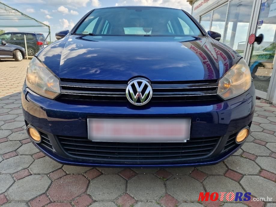 2011' Volkswagen Golf VI 1,6 Tdi photo #2