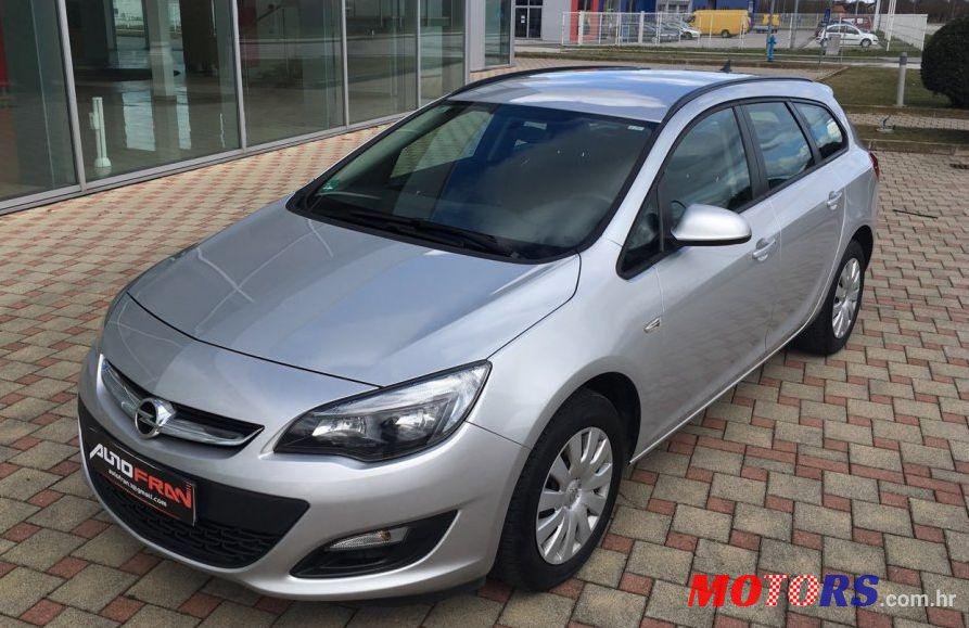 2015' Opel Astra Karavan photo #1