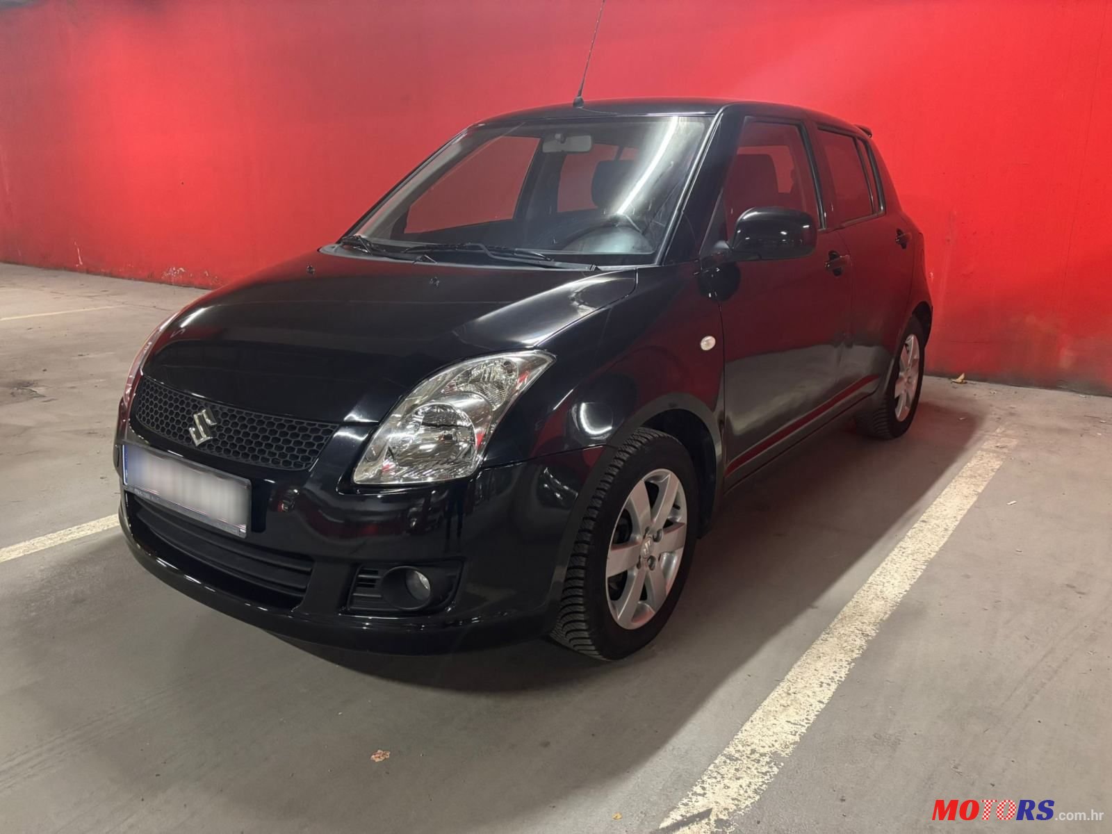 2009' Suzuki Swift 1,3 Glx photo #1