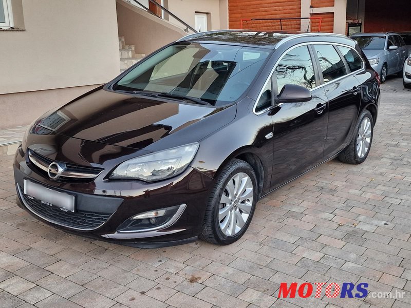 2014' Opel Astra Karavan photo #1