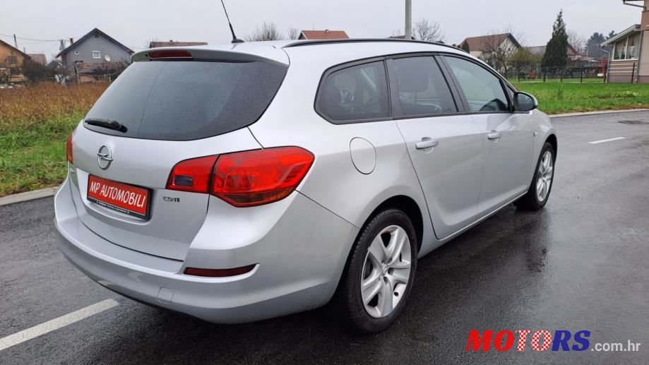 2011' Opel Astra Karavan photo #6