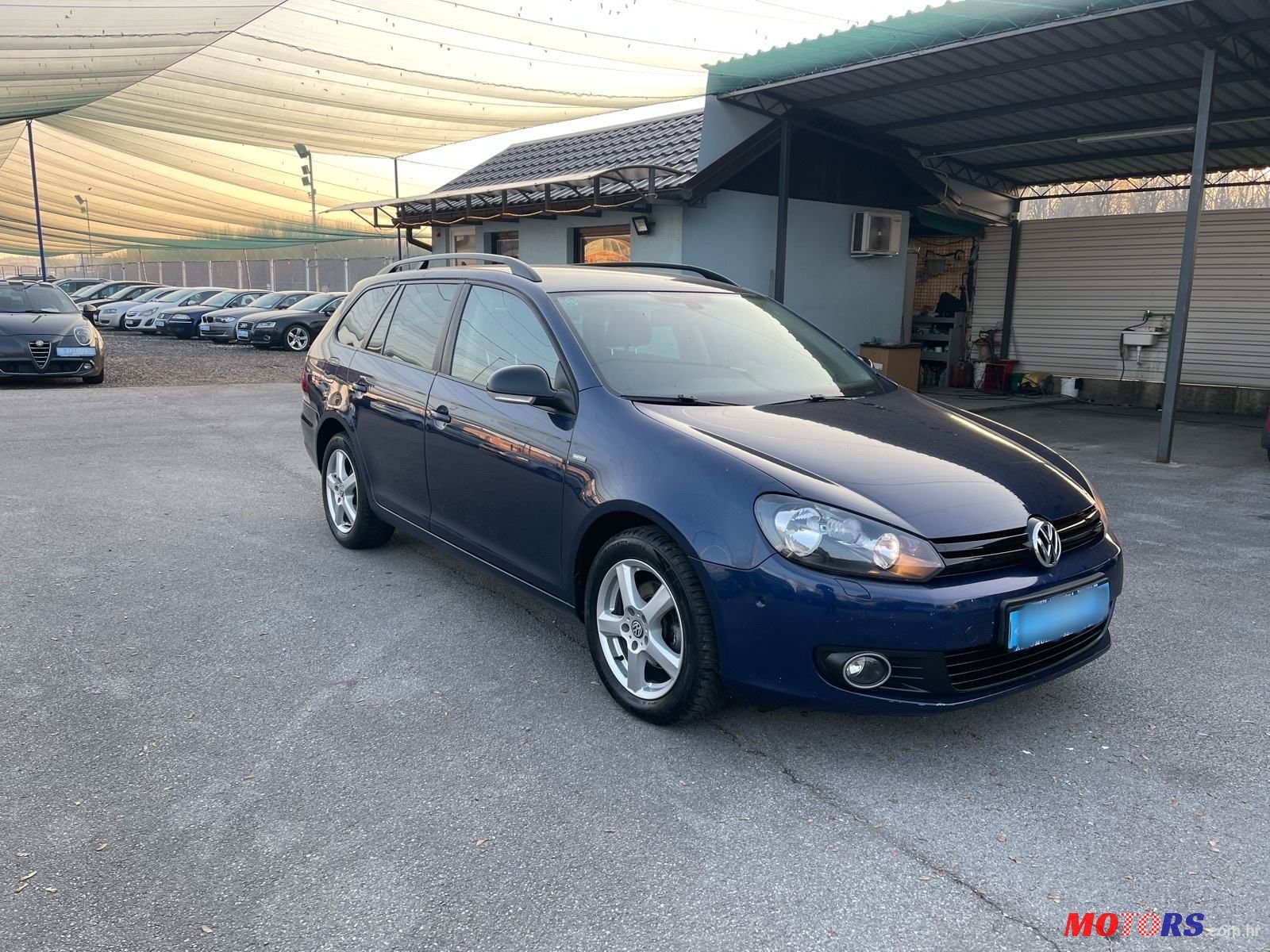 2012' Volkswagen Golf VI Variant photo #2