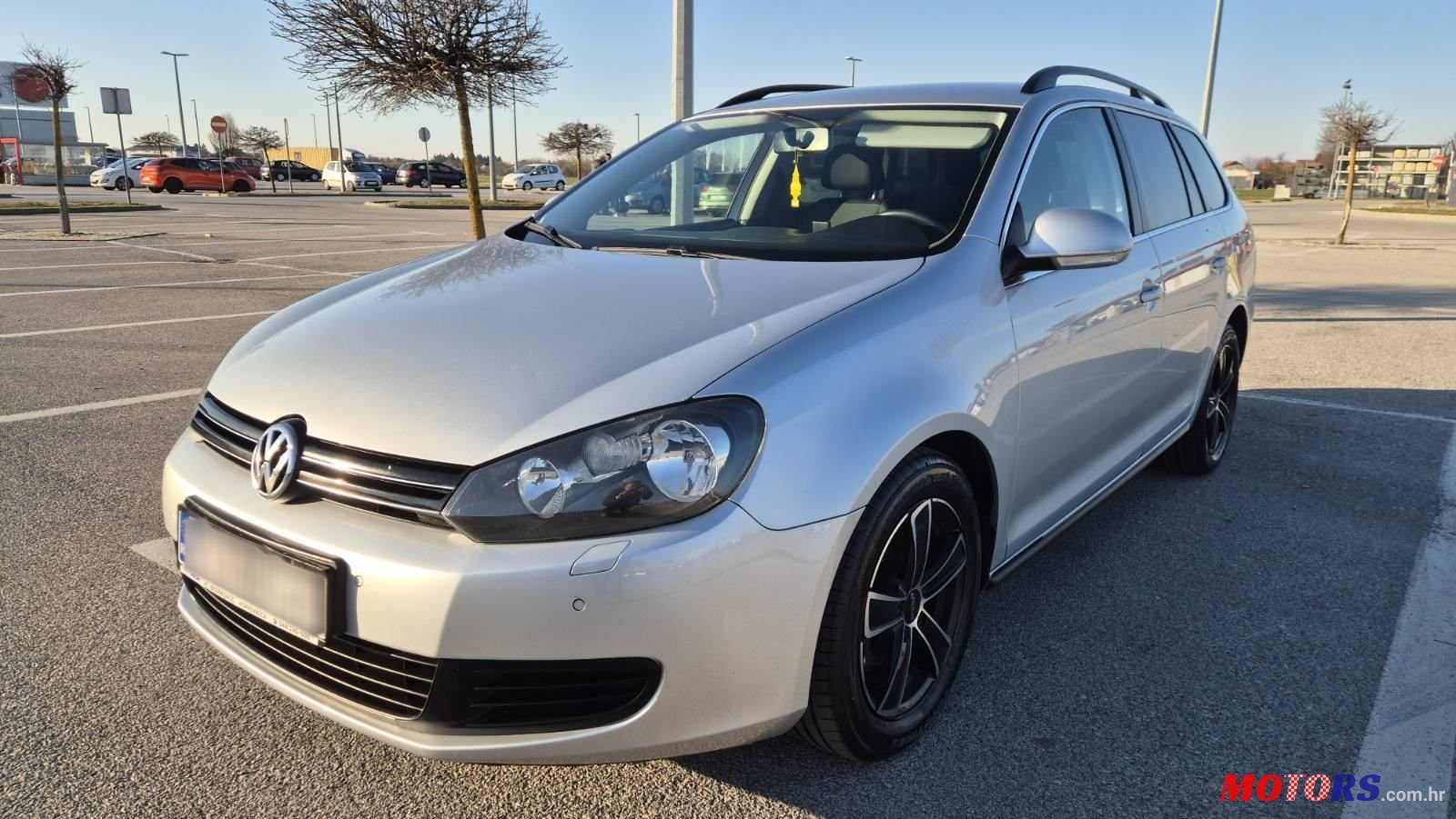 2011' Volkswagen Golf VI Variant photo #1