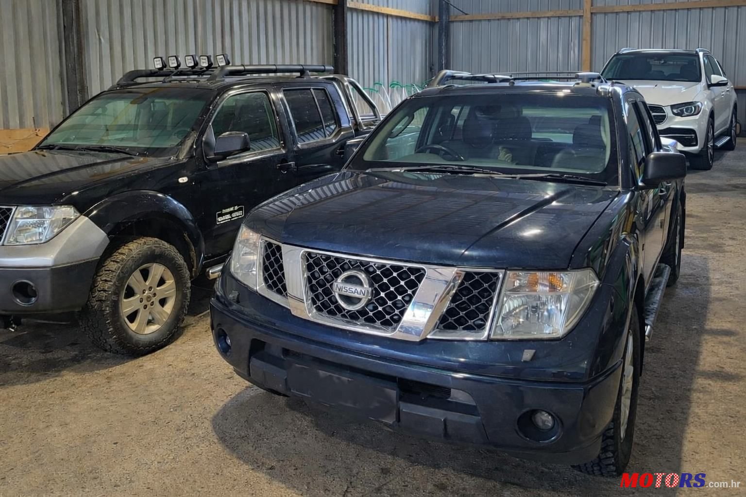 2006' Nissan Navara 2.5 photo #1