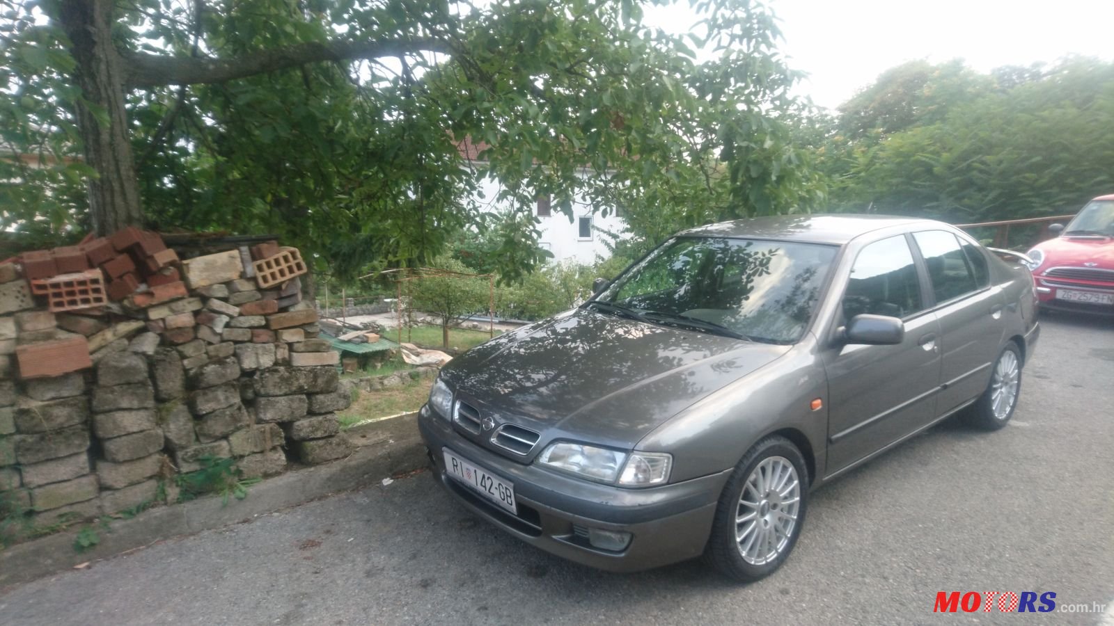 1997' Nissan Primera 1,6 SLX photo #1