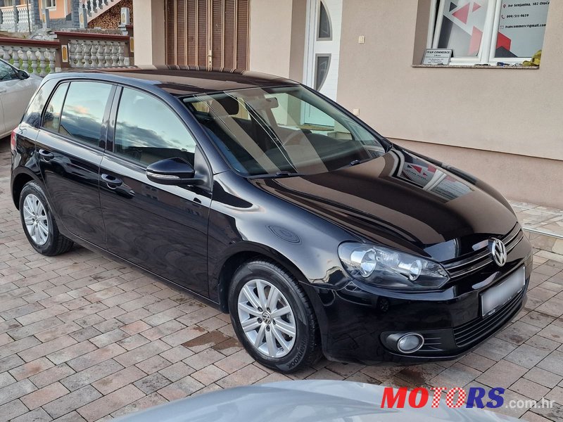 2012' Volkswagen Golf VI 1,6 Tdi photo #6