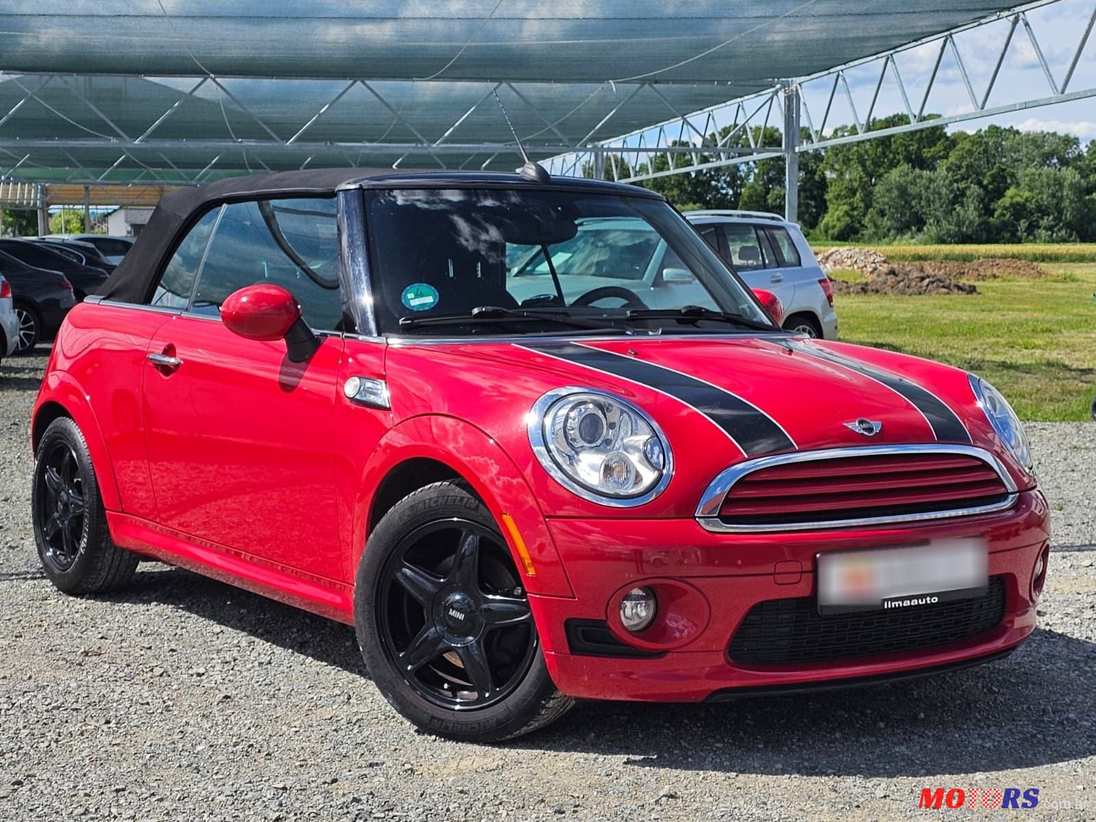 2009' MINI Cooper Cabrio photo #1