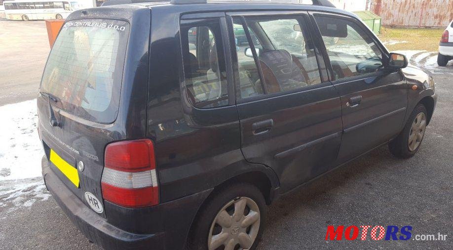 1999' Mazda Demio 1,4 I Se photo #1