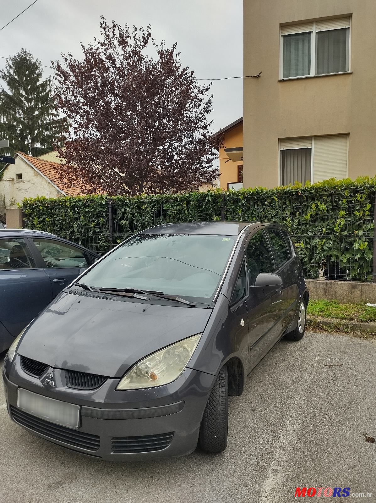 2004' Mitsubishi Colt 1,1 photo #3