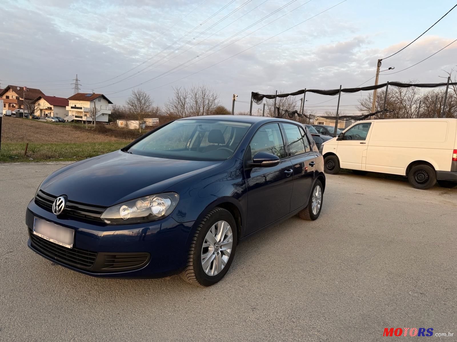 2010' Volkswagen Golf VI 1,6 Tdi photo #1