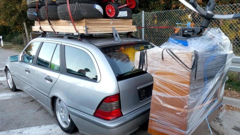 Police catch overloaded car with piano on a bike rack — on the Autobahn