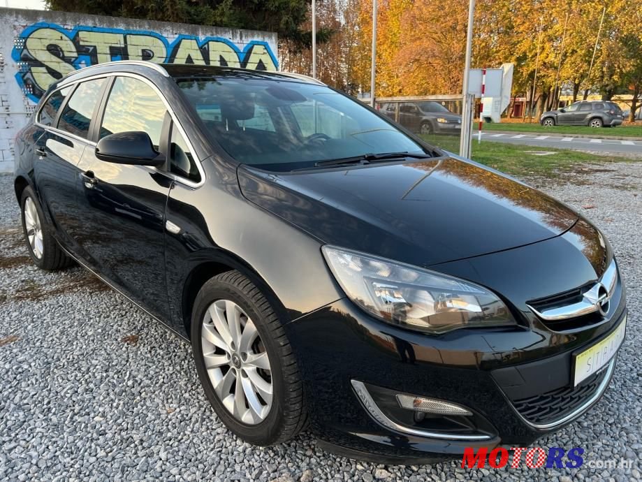 2013' Opel Astra Karavan photo #1