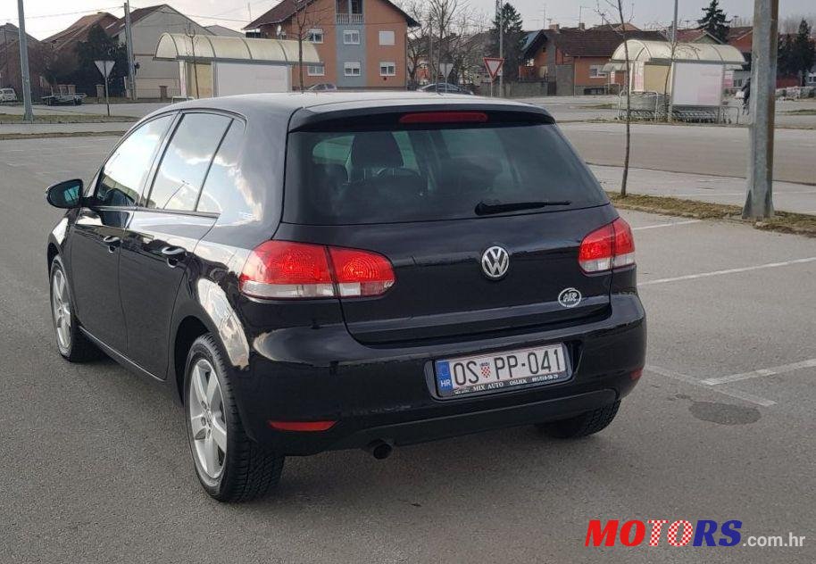 2010' Volkswagen Golf VI 1,6 Tdi photo #1