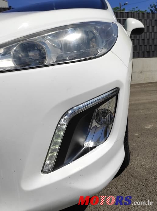 2014' Peugeot 308 Sw photo #4